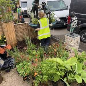 Putting the finishing touches on the Robert James Workshop stand at RHS Chelsea Flower Show Putting the finishing touches on the Robert James Workshop stand at RHS Chelsea Flower Show