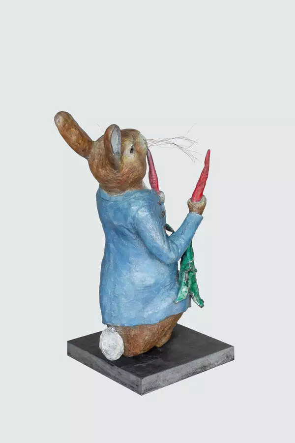 Peter Rabbit eating Radishes - Bronze Garden Sculpture
