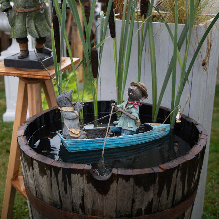 Ratty and Mole in a river boat