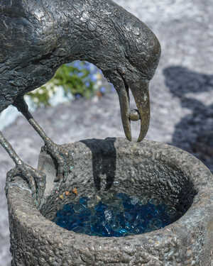 crow and the pitcher water feature from aesop's fables