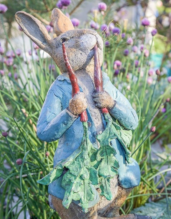 Peter Rabbit eating Radishes - Bronze Garden Sculpture
