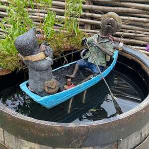 ratty and mole in a boat