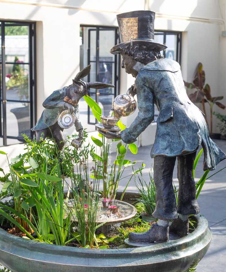 Hand-drawn illustrations of Winnie-the-Pooh, Piglet, Kanga, and Rabbit, by E.H Shepard